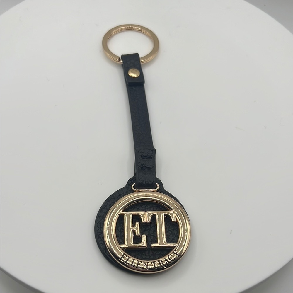 858. Ellen Tracy Black and Gold Keychain